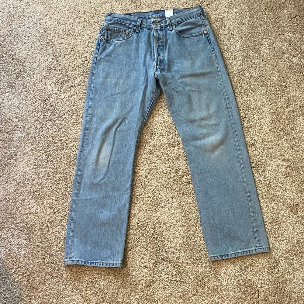 blue levi distressed jeans